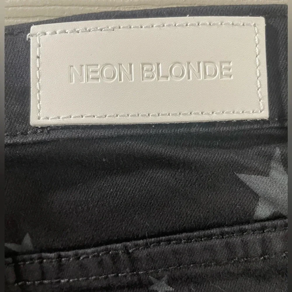 Neon blonde black star tease mini skirt NWT size 27.